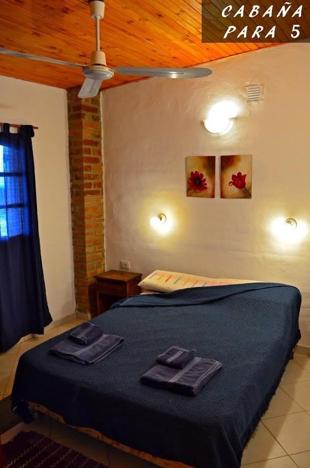 Dormitorio de una cabaña para 5 personas en Complejo Laguna Azul, Los Molles, San Luis